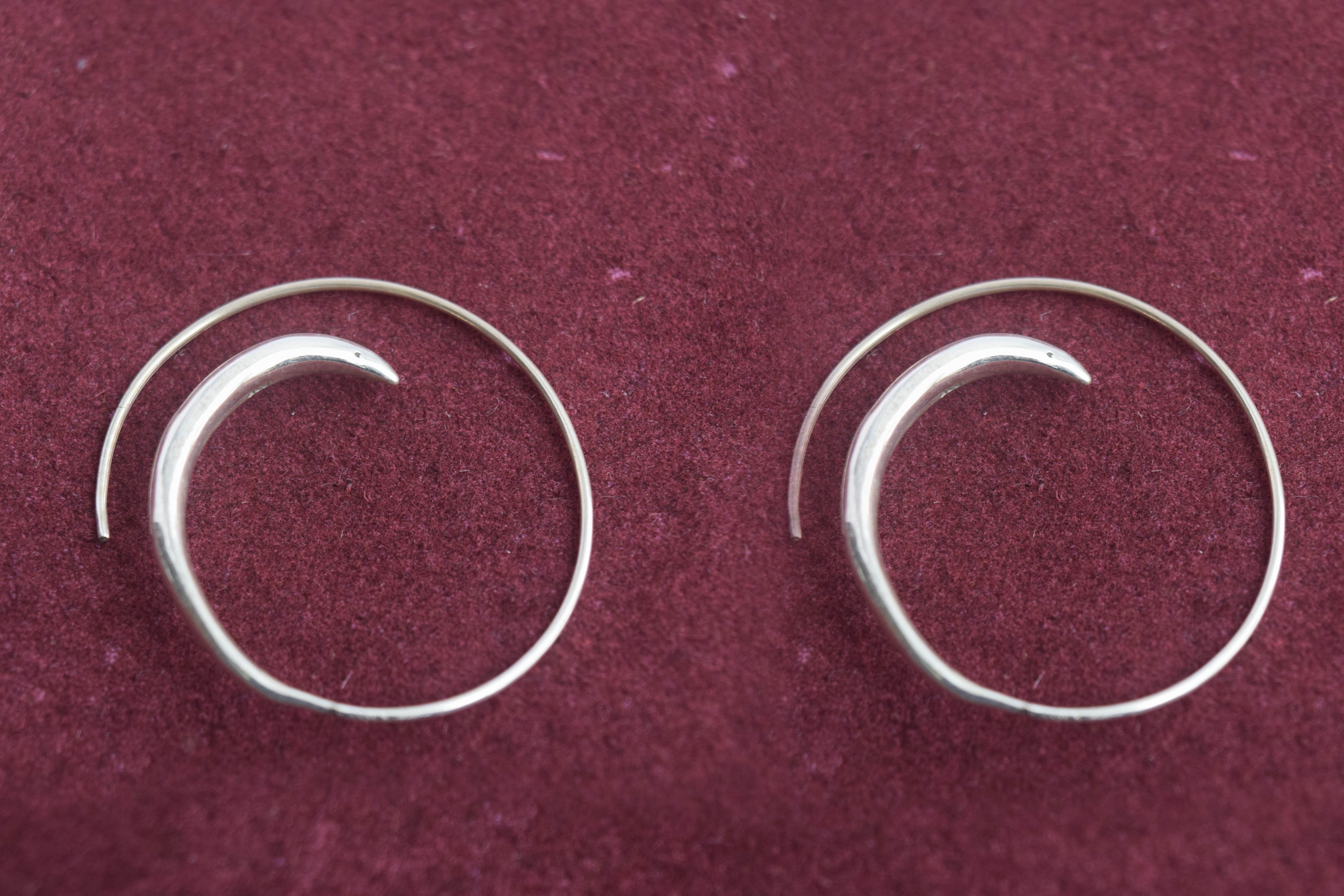 Silver round beyond O Earring