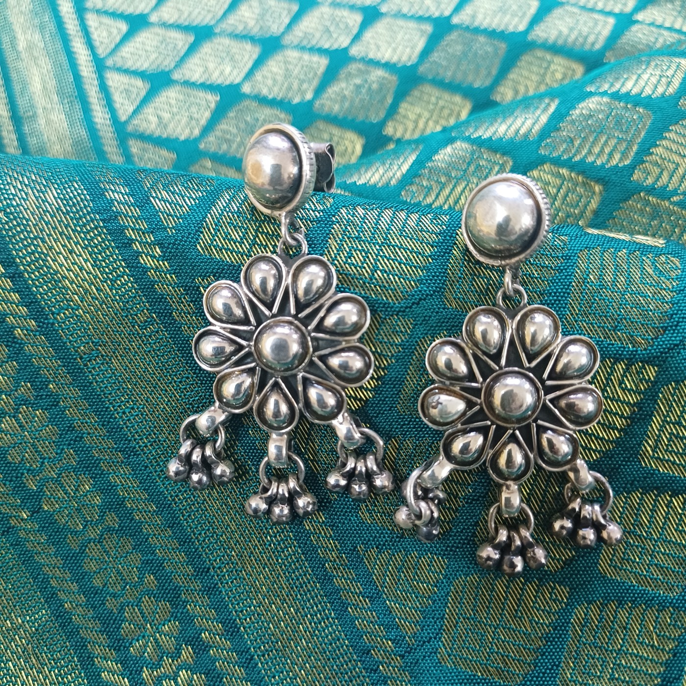 Twaksati 925 Silver Carved Flower Jhumkas with Nine Silver Drops